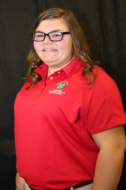 STATE-OFFICER-RED-POLO-HEAD-SHOT